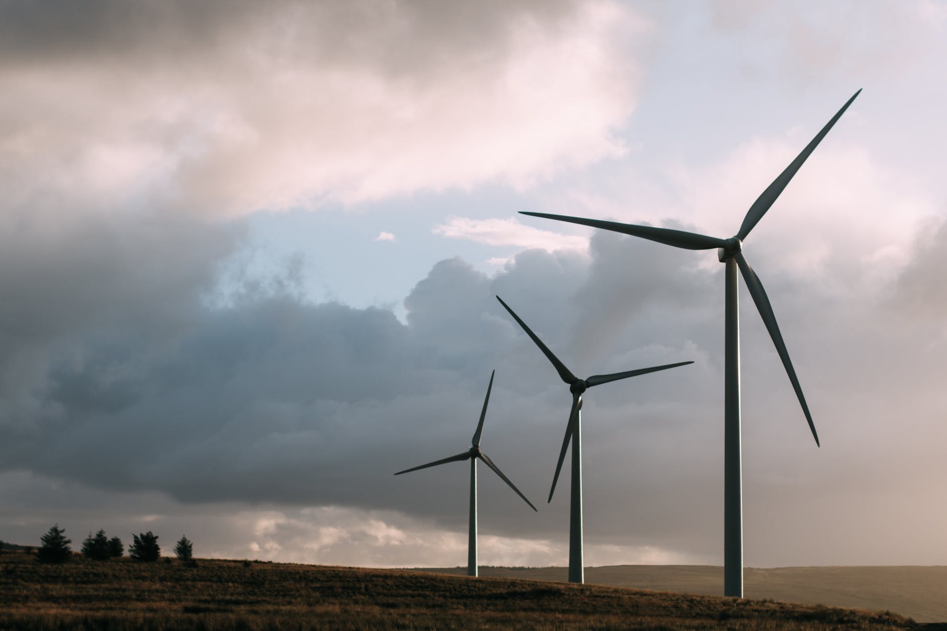 three gray wind turbine